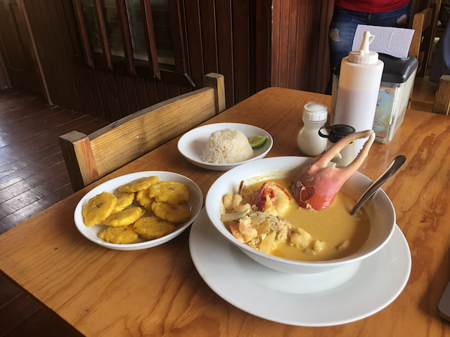 Seafood soup with tostones and rice